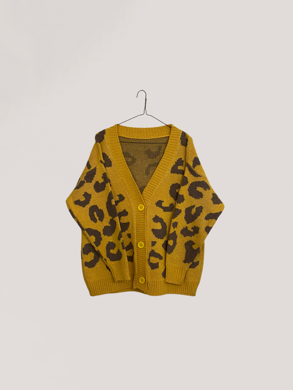 “Luxe Wild Knit Cardigan – Signature Animal Print Collection”