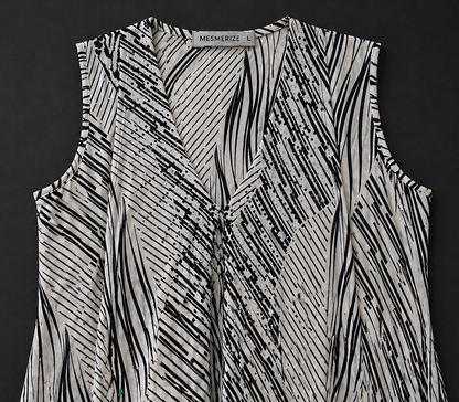 Mesmerize Sequin Asymmetrical Top – Black & White Chic Blouse