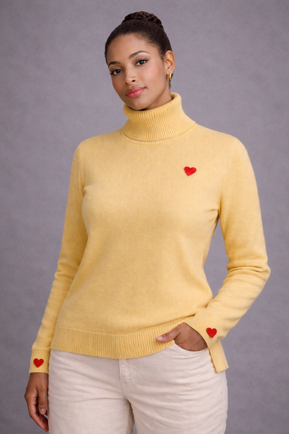 “Signature Heartline Luxe Turtleneck Sweater”