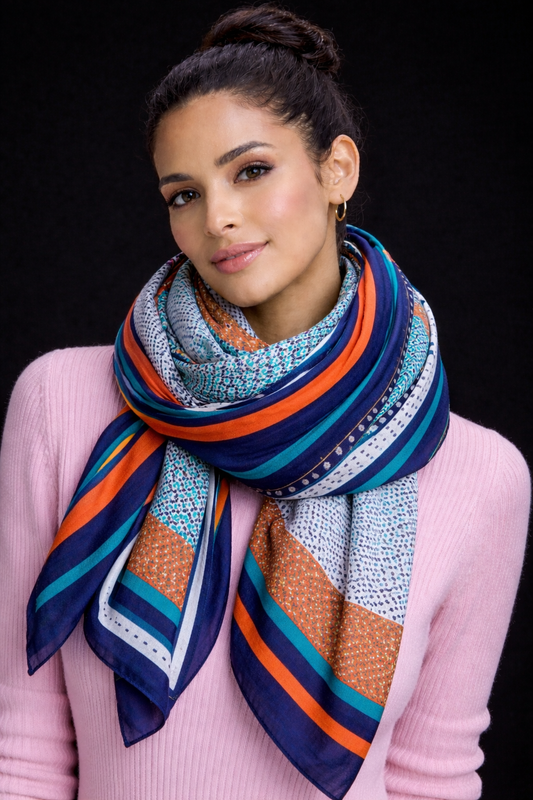 Multicolor 100% Viscose scarf with bold geometric and paisley patterns. Soft, breathable, and comfortable for everyday wear.