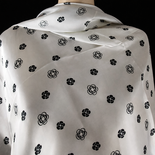 Silky-feel scarf with floral motifs